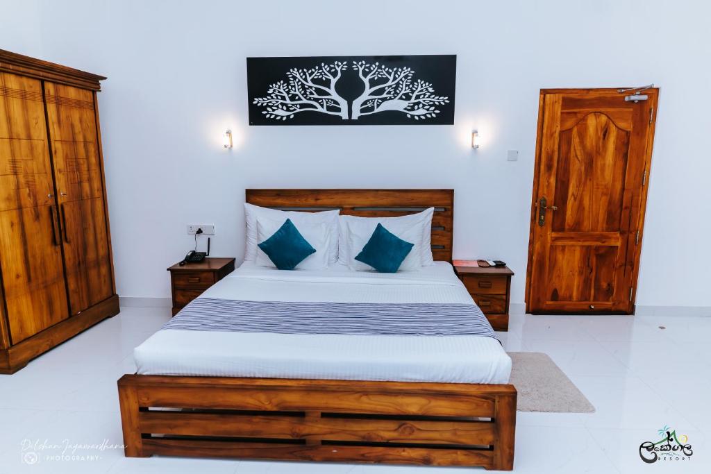 Postel nebo postele na pokoji v ubytování Lakegala Resort