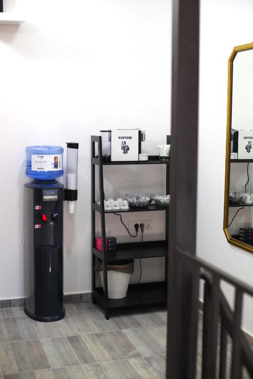 Kuchyň nebo kuchyňský kout v ubytování Aster Apartments