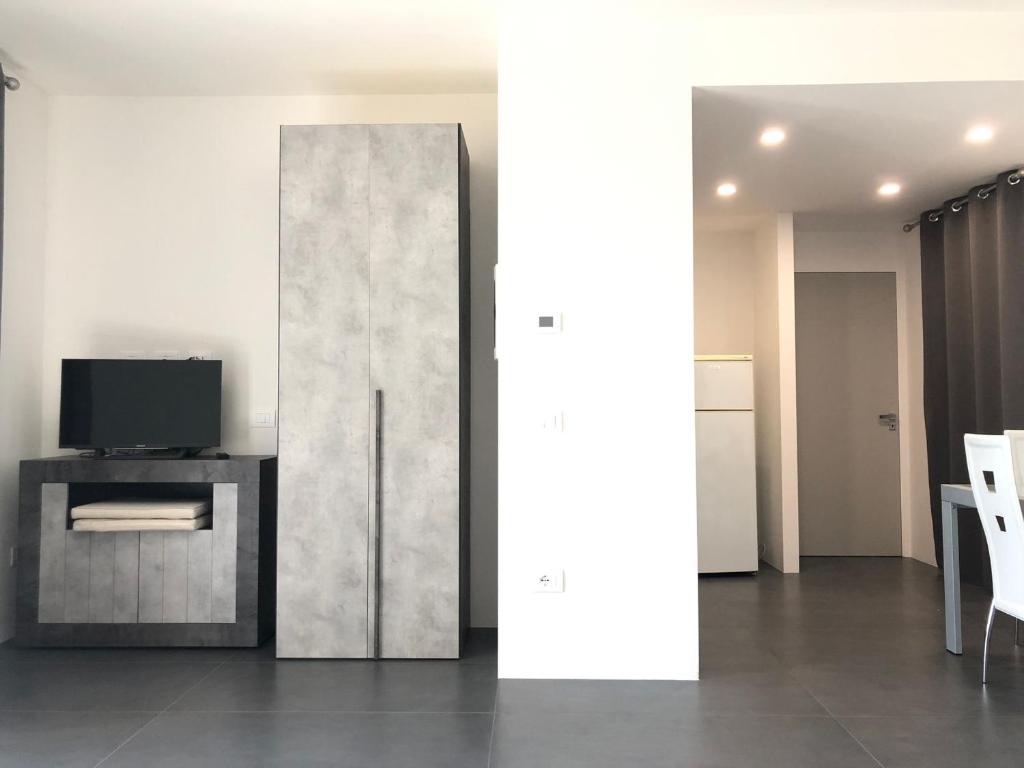 Televízia a/alebo spoločenská miestnosť v ubytovaní Casa Ginevra a Cecina by Zoom In Earth
