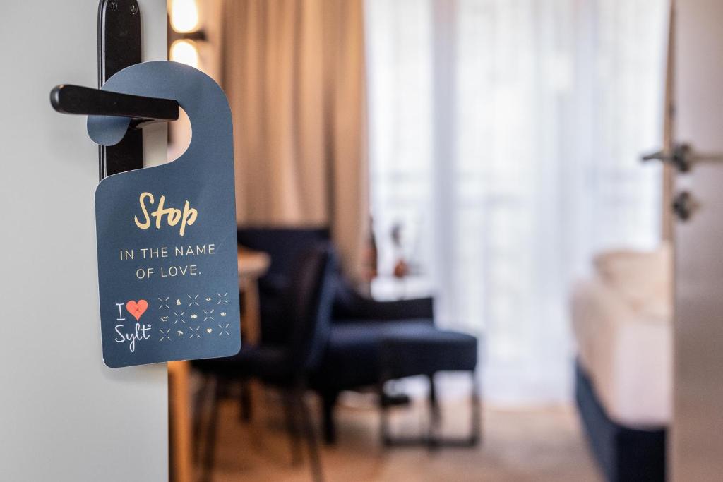 Voodi või voodid majutusasutuse I LOVE SYLT Hotel Terminus ADULTS ONLY toas