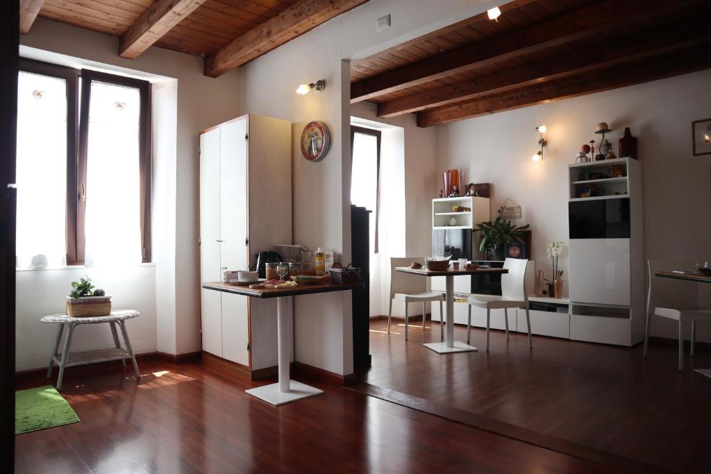 TV a/nebo společenská místnost v ubytování Cuscino e Cappuccino B&B