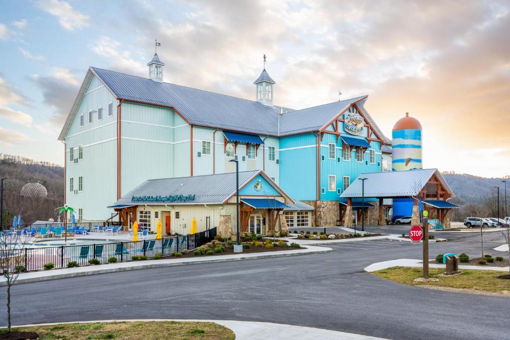 a blue and white building with a blue sky at Camp Margaritaville RV Resort & Lodge in Pigeon Forge