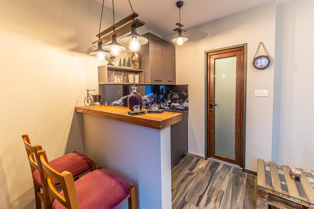 Kuchyň nebo kuchyňský kout v ubytování Apartman_PidžuN