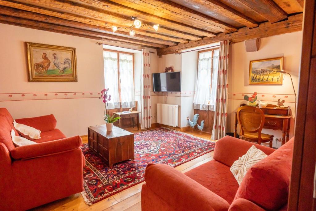 TV a/nebo společenská místnost v ubytování Hotel à l'Oriel