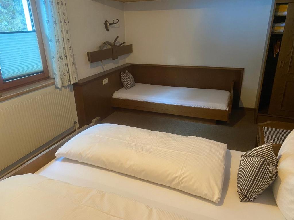 Postel nebo postele na pokoji v ubytování Haus Schnöller