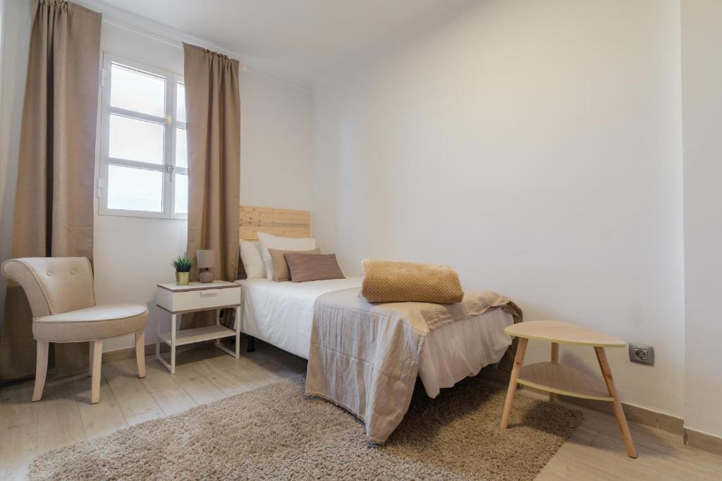 Postel nebo postele na pokoji v ubytování Arcasa by Villas Rinamar