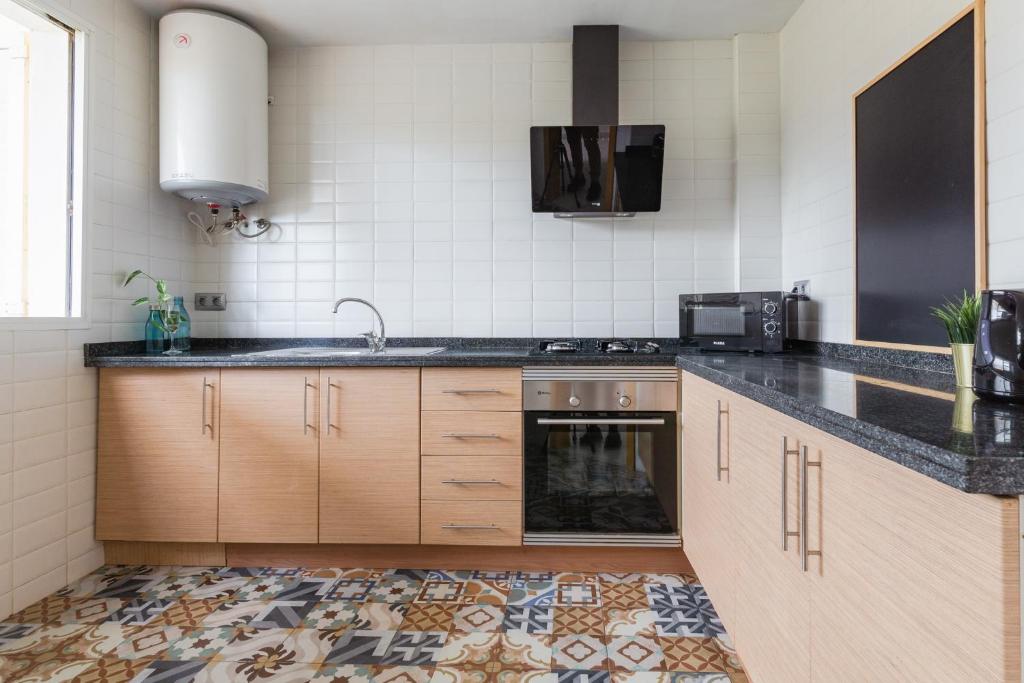 Kuchyň nebo kuchyňský kout v ubytování Arcasa by Villas Rinamar