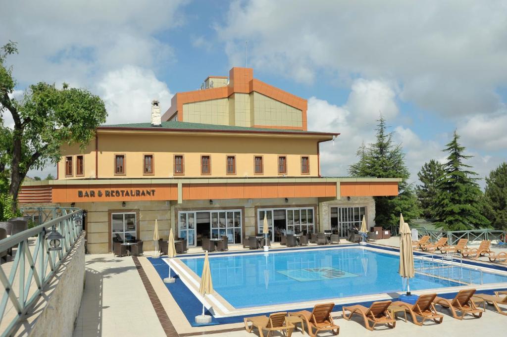 Bazén v ubytování Monark Hotel Cappadocia nebo v jeho okolí
