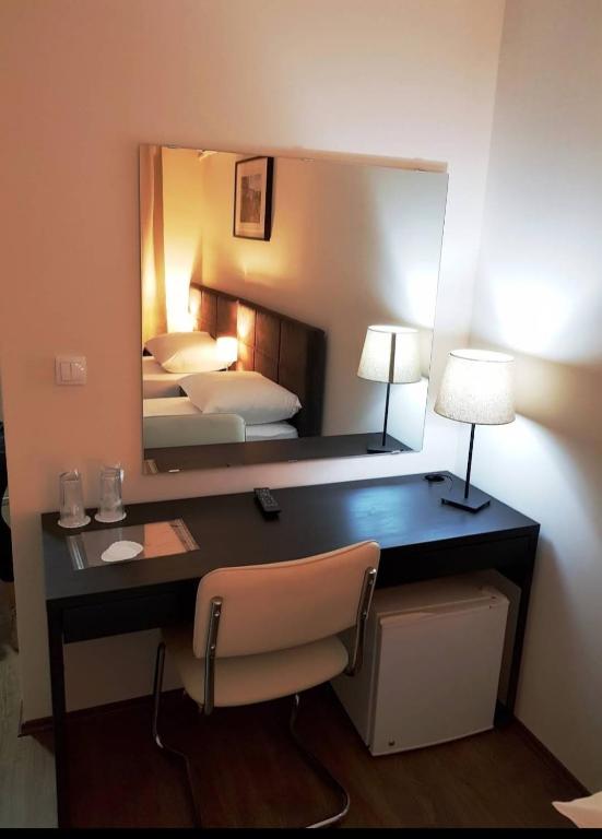 Postel nebo postele na pokoji v ubytování Hotel Villa Panorama
