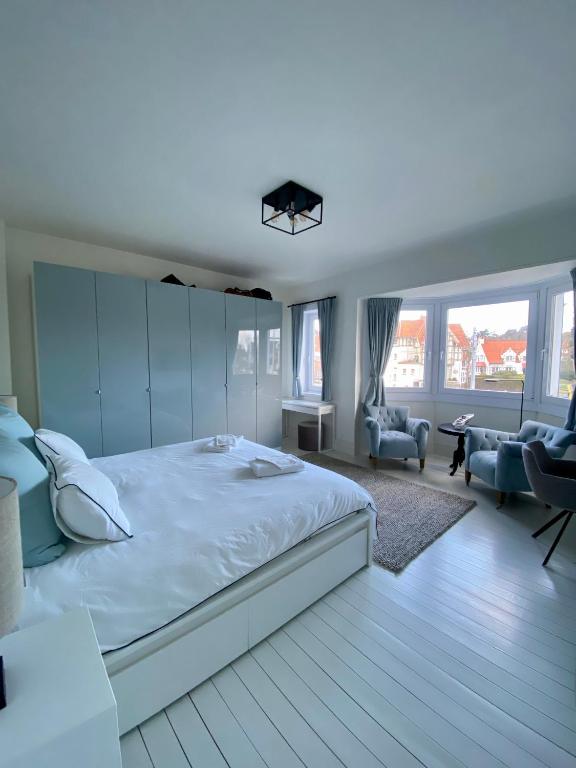Postel nebo postele na pokoji v ubytování Instant Knokke
