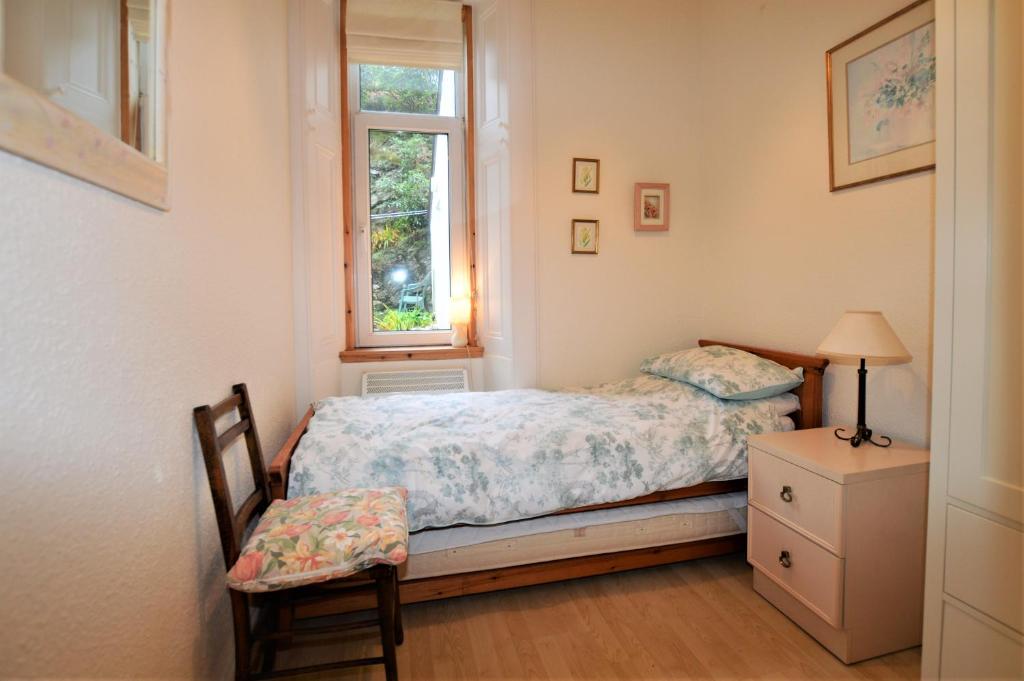 Postel nebo postele na pokoji v ubytování Kames View Apartment