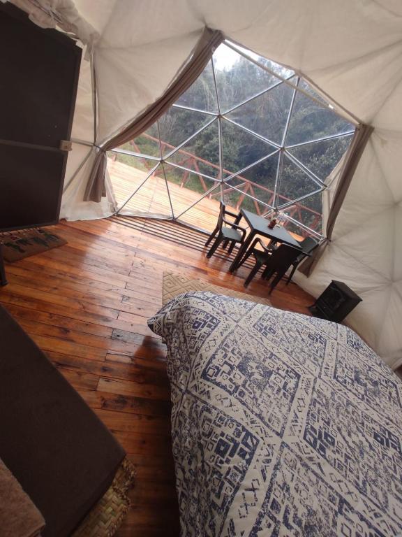 Postel nebo postele na pokoji v ubytování Chimborazo Basecamp