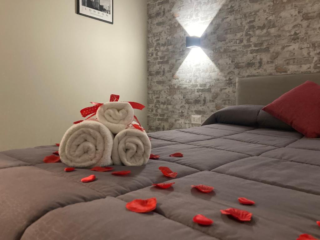 Postel nebo postele na pokoji v ubytování Hotel IL DIRETTO