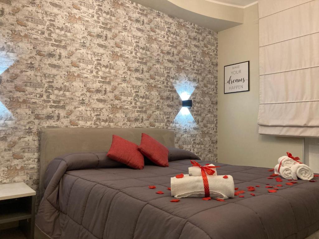 Postel nebo postele na pokoji v ubytování Hotel IL DIRETTO