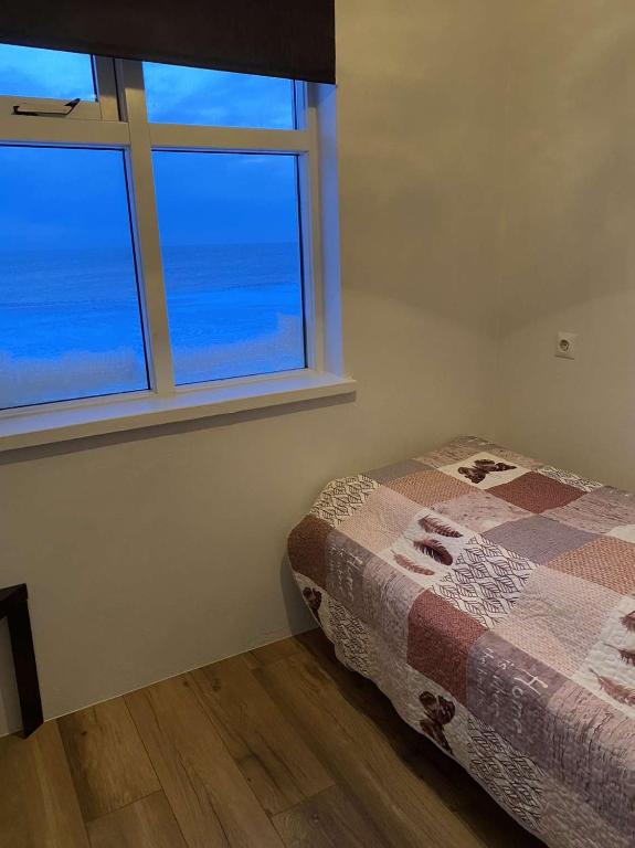 Postel nebo postele na pokoji v ubytování Guesthouse Básar