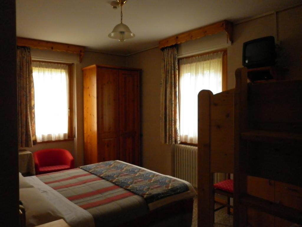 Letto o letti in una camera di Hotel Zebrù