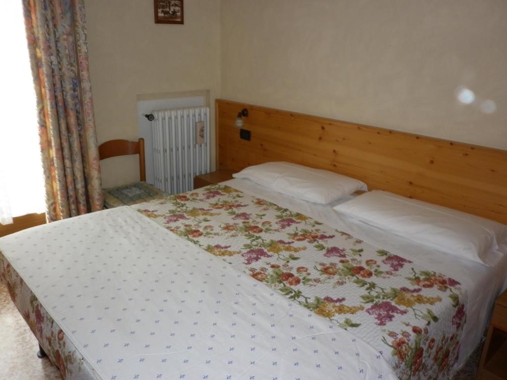 Letto o letti in una camera di Hotel Zebrù