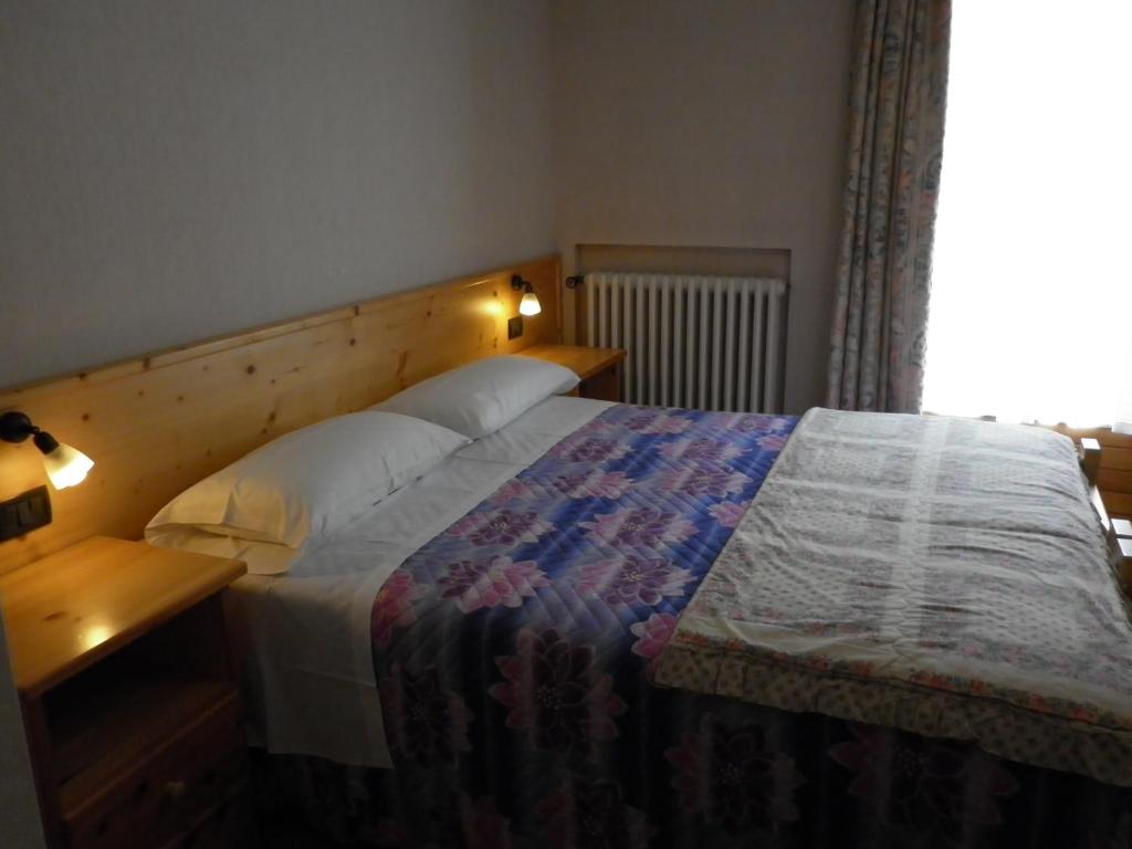 Letto o letti in una camera di Hotel Zebrù
