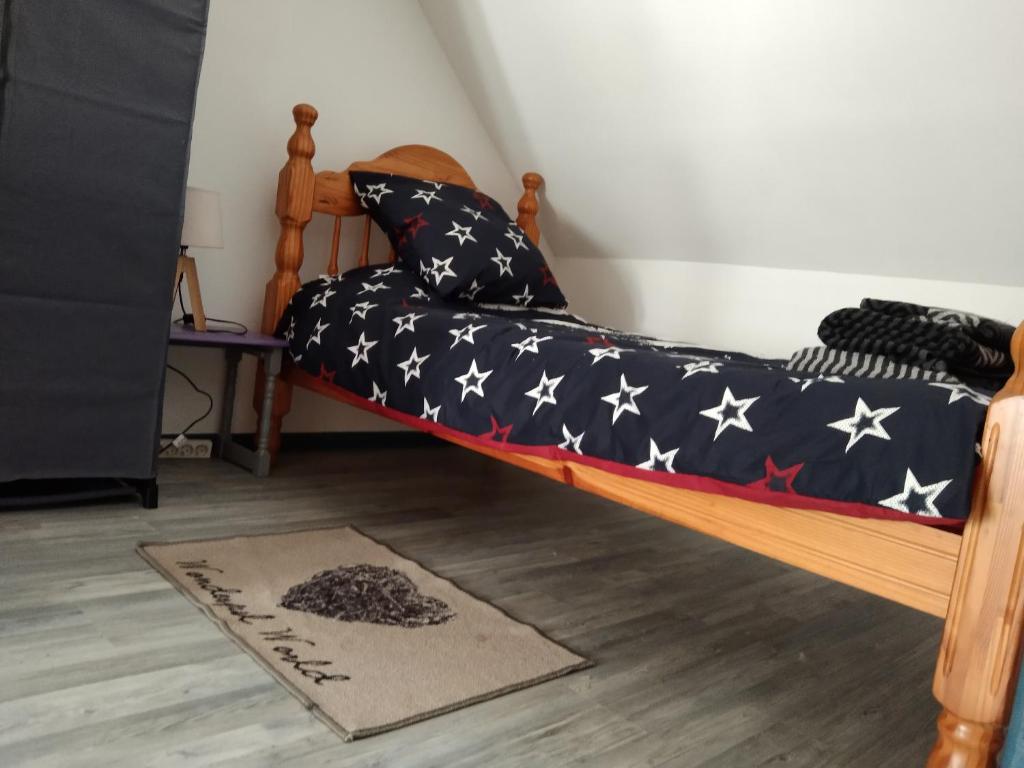 Postel nebo postele na pokoji v ubytování Craftycotta