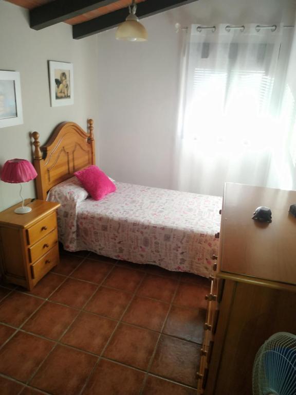 Postel nebo postele na pokoji v ubytování PUNTA SOL