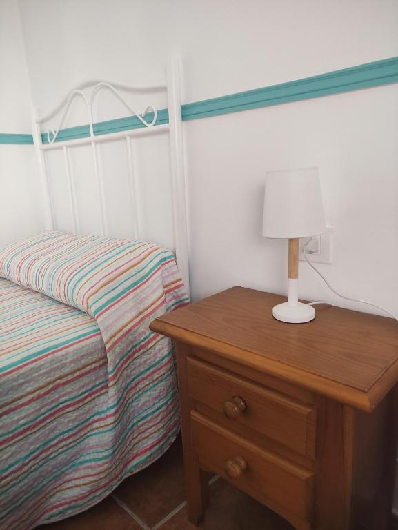 Postel nebo postele na pokoji v ubytování PUNTA SOL