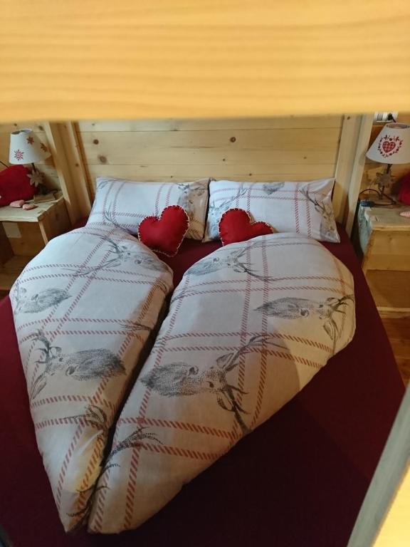 Posteľ alebo postele v izbe v ubytovaní Mini Chalet Walser