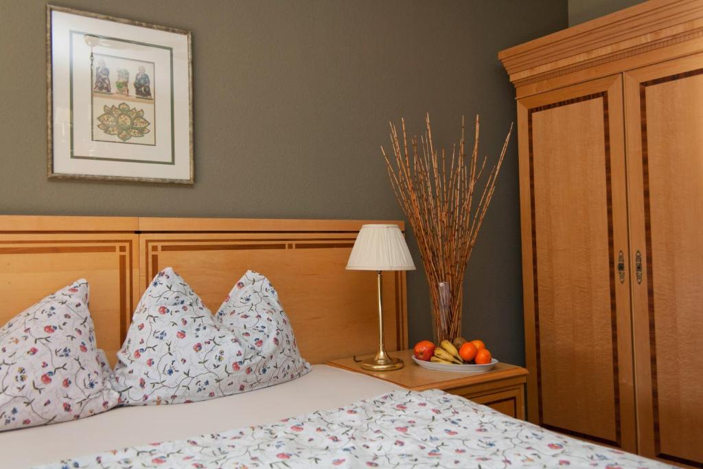 Postel nebo postele na pokoji v ubytování Hotel Cafe Frida