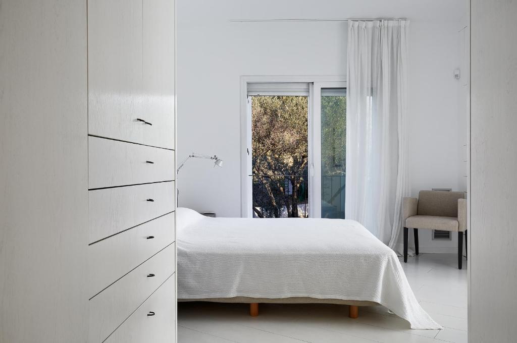 Posteľ alebo postele v izbe v ubytovaní Canvas Apartments&Lofts