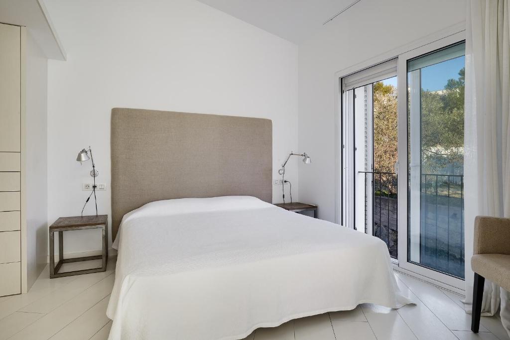Кровать или кровати в номере Canvas Apartments&Lofts