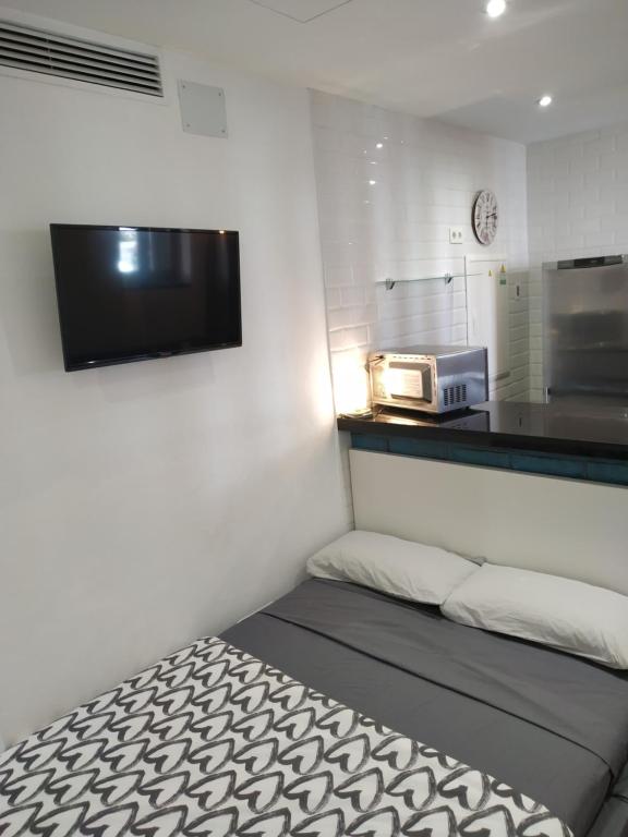 Kuchyňa alebo kuchynka v ubytovaní Altozano Room III, Estudió centro de Málaga Gayfriendly, Wi-Fi gratis