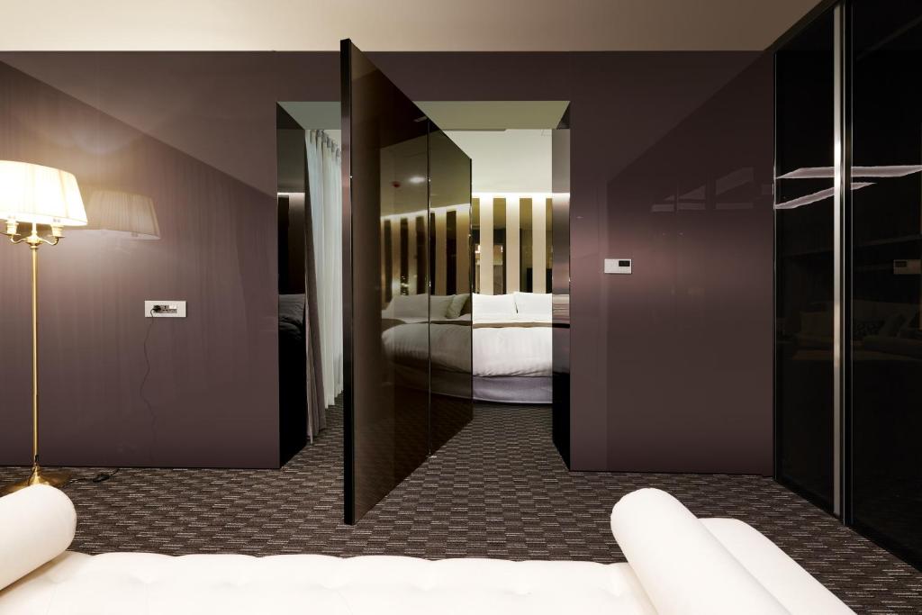Postel nebo postele na pokoji v ubytování Jeongseon Intoraon Hotel