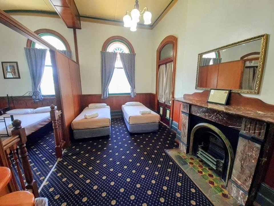 Postelja oz. postelje v sobi nastanitve Criterion Hotel-Motel Rockhampton