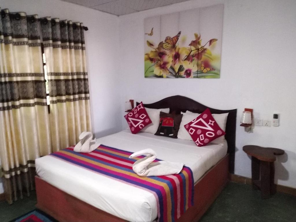 Postel nebo postele na pokoji v ubytování Gangula Eco lodge