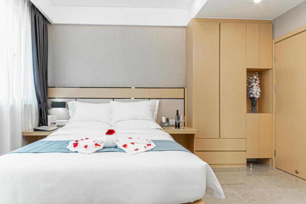 Postel nebo postele na pokoji v ubytování ARK HOTEL