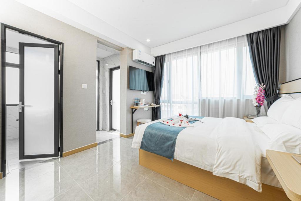 Postel nebo postele na pokoji v ubytování ARK HOTEL