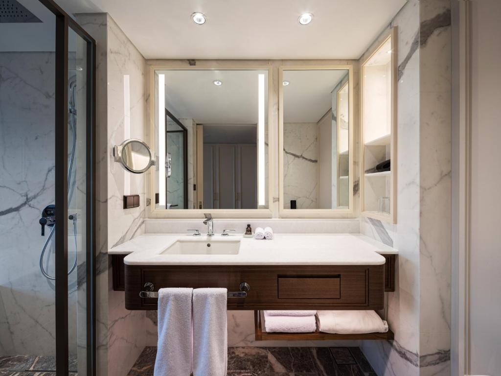 Um banheiro em The Ambassador Seoul - A Pullman Hotel