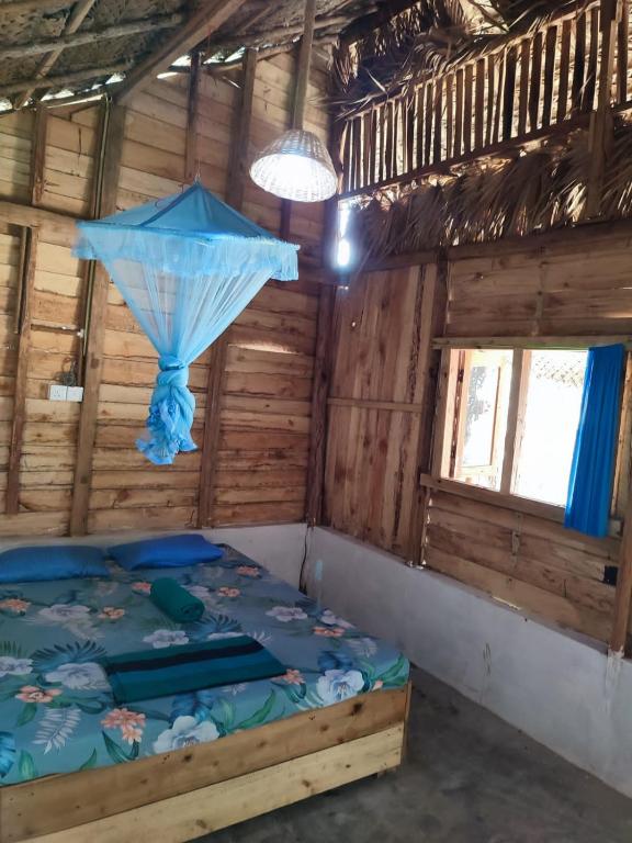 Postel nebo postele na pokoji v ubytování araliya villa