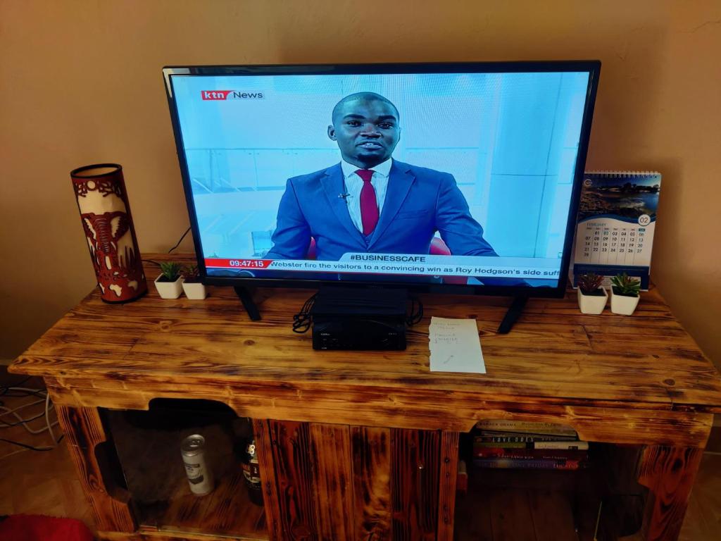 TV a/nebo společenská místnost v ubytování Ella's Haven