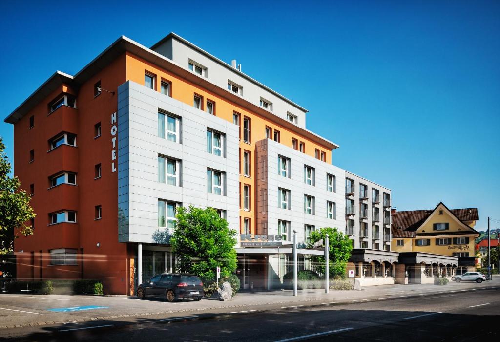 a building on the side of a street at Hotel Krone in Dornbirn