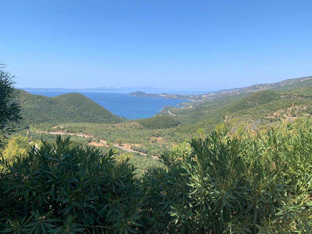 a view of the ocean from the hills at Μπαλλας Παναγιωτης BallasStudios in Perdika
