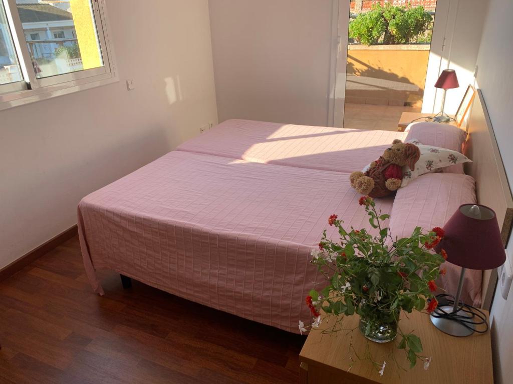 A bed or beds in a room at Villa Dacar