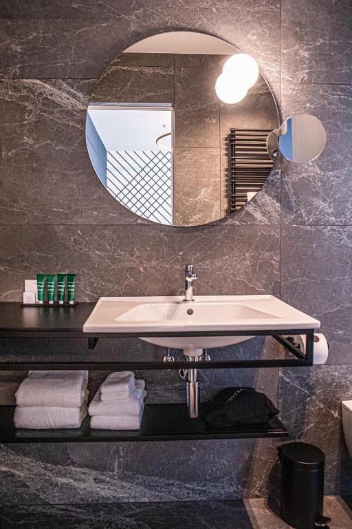 Kopalnica v nastanitvi Hotel Čad