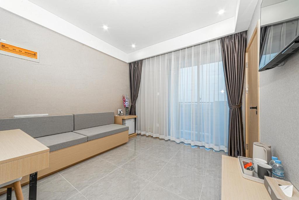 TV a/nebo společenská místnost v ubytování ARK HOTEL