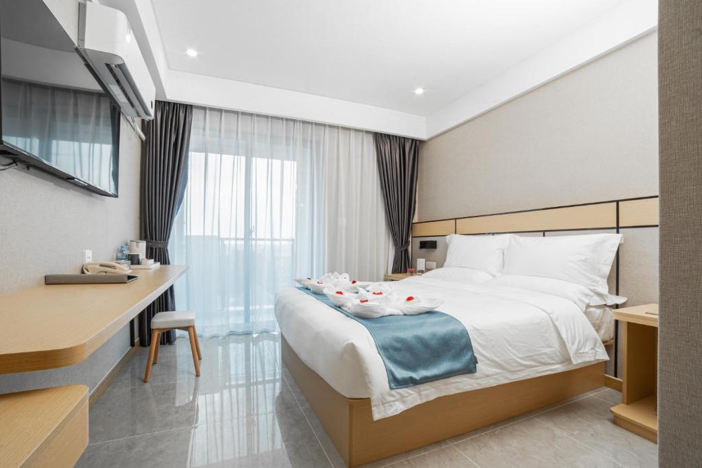 Postel nebo postele na pokoji v ubytování ARK HOTEL