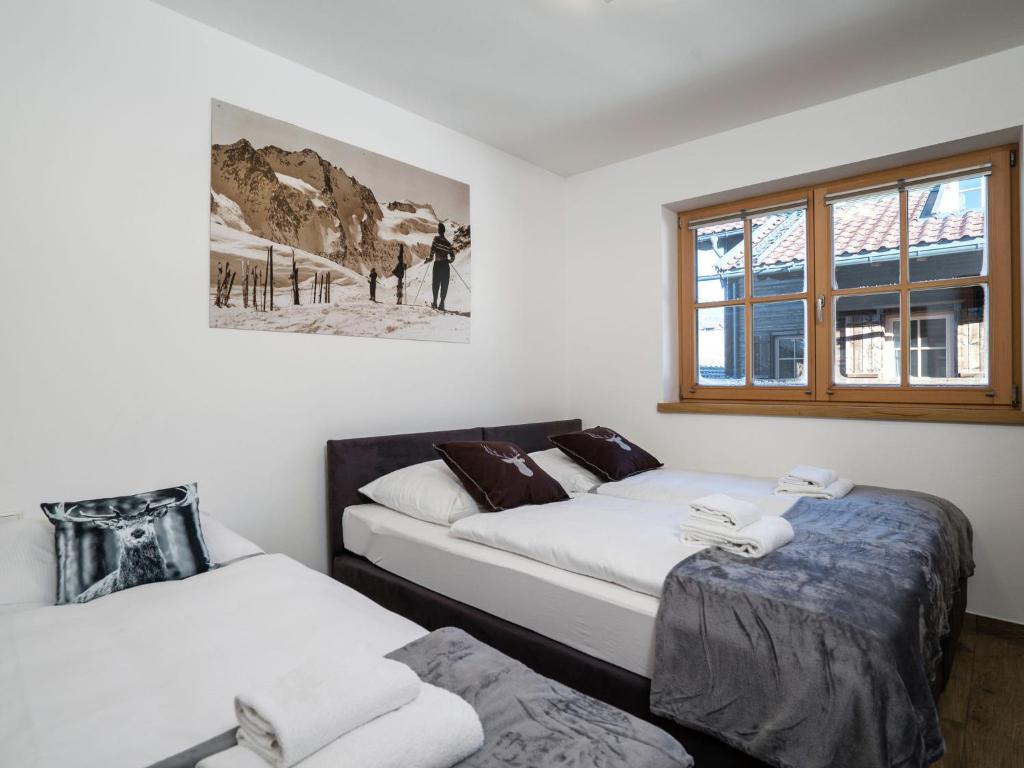Posteľ alebo postele v izbe v ubytovaní Apartment in ski area KitzSki Hollersbach