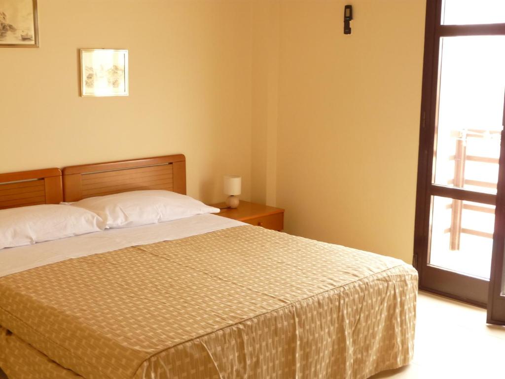 Postel nebo postele na pokoji v ubytování Agathae Hotel & Residence