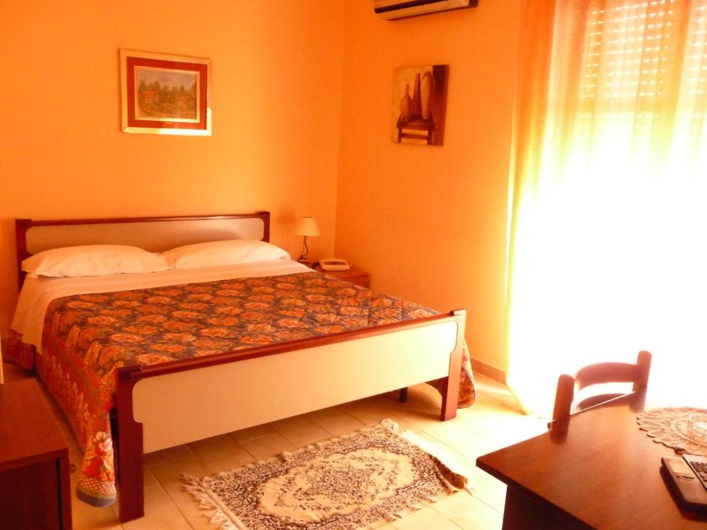 Postel nebo postele na pokoji v ubytování Agathae Hotel & Residence