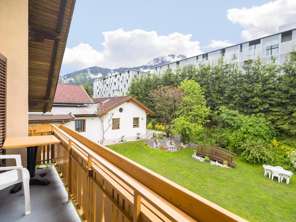 a balcony with a view of a yard at Apartment in Tr polach Carinthia with pool in Tröpolach