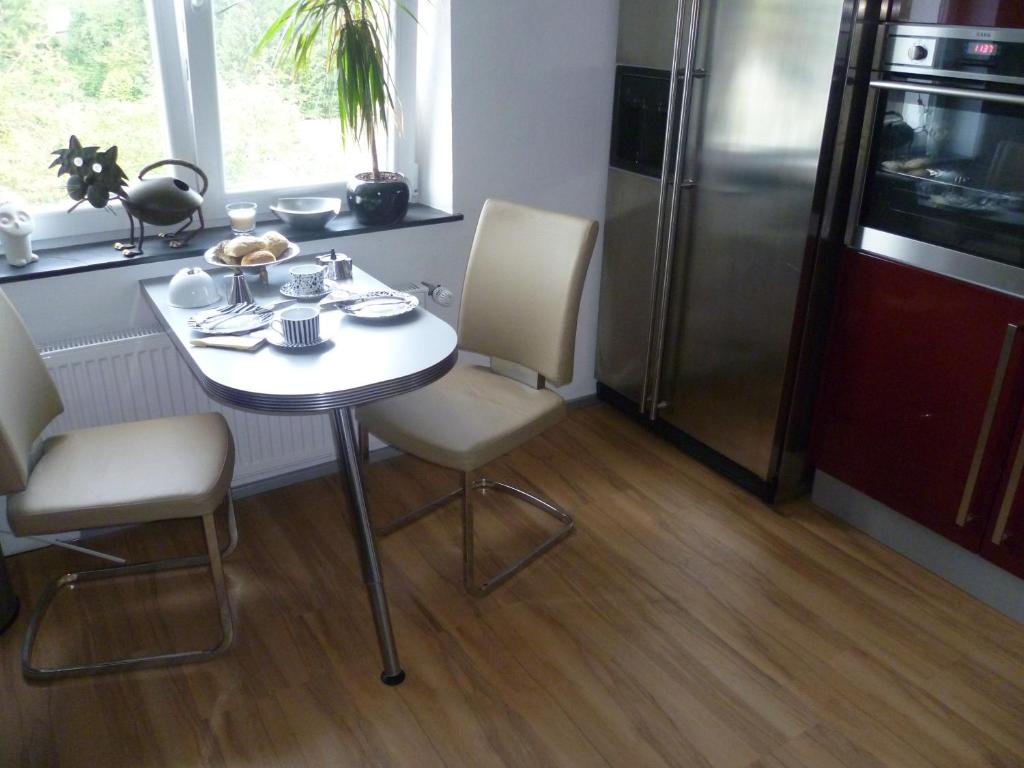 Kuchyň nebo kuchyňský kout v ubytování Ambiente