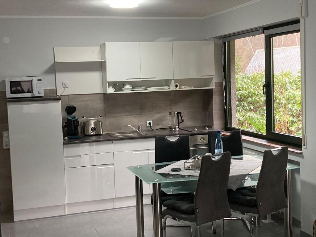 Kuchyň nebo kuchyňský kout v ubytování Ferienwohnung Haus Ilse